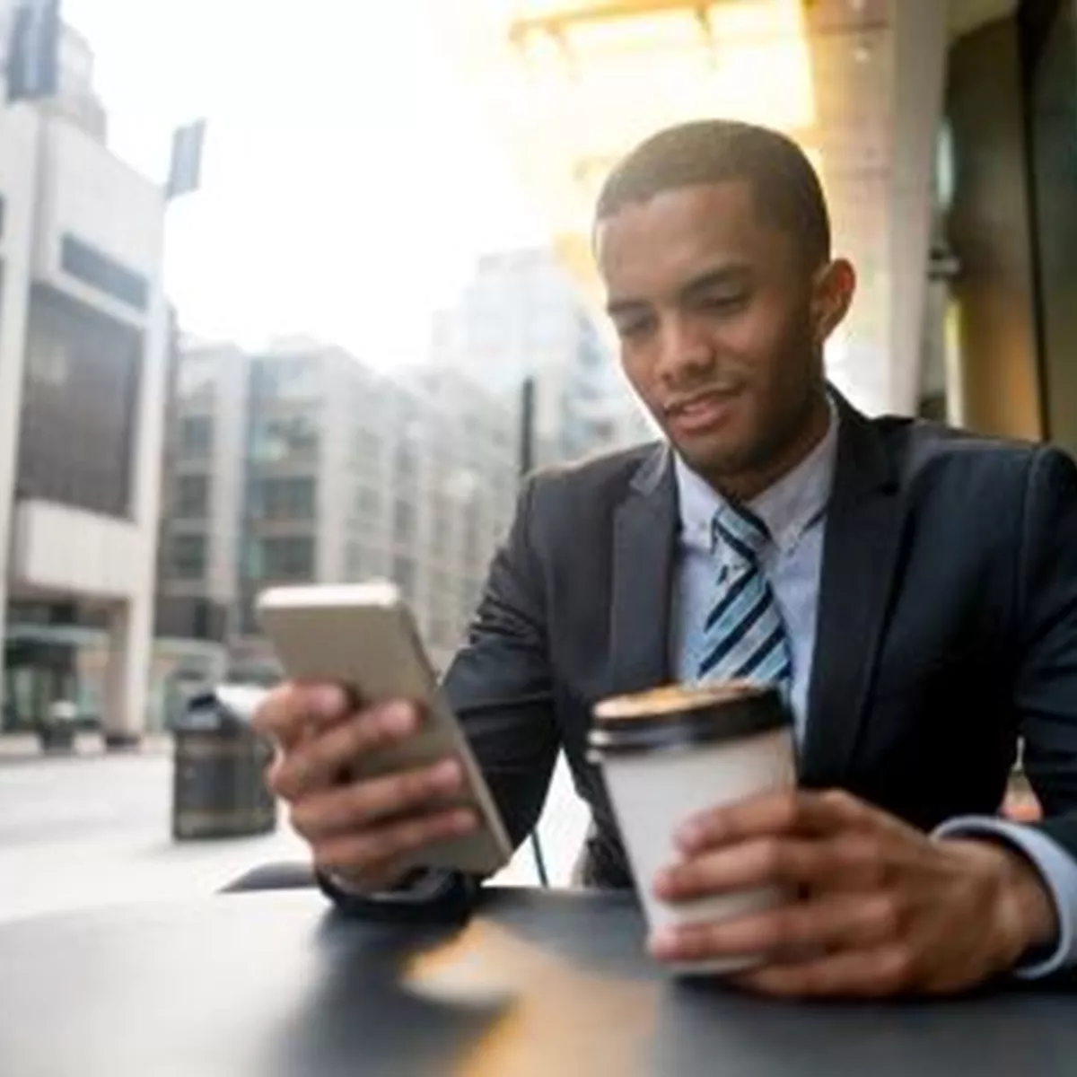 Man Phone And Coffee