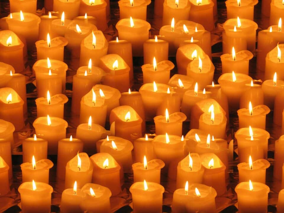 collection of many lit candles