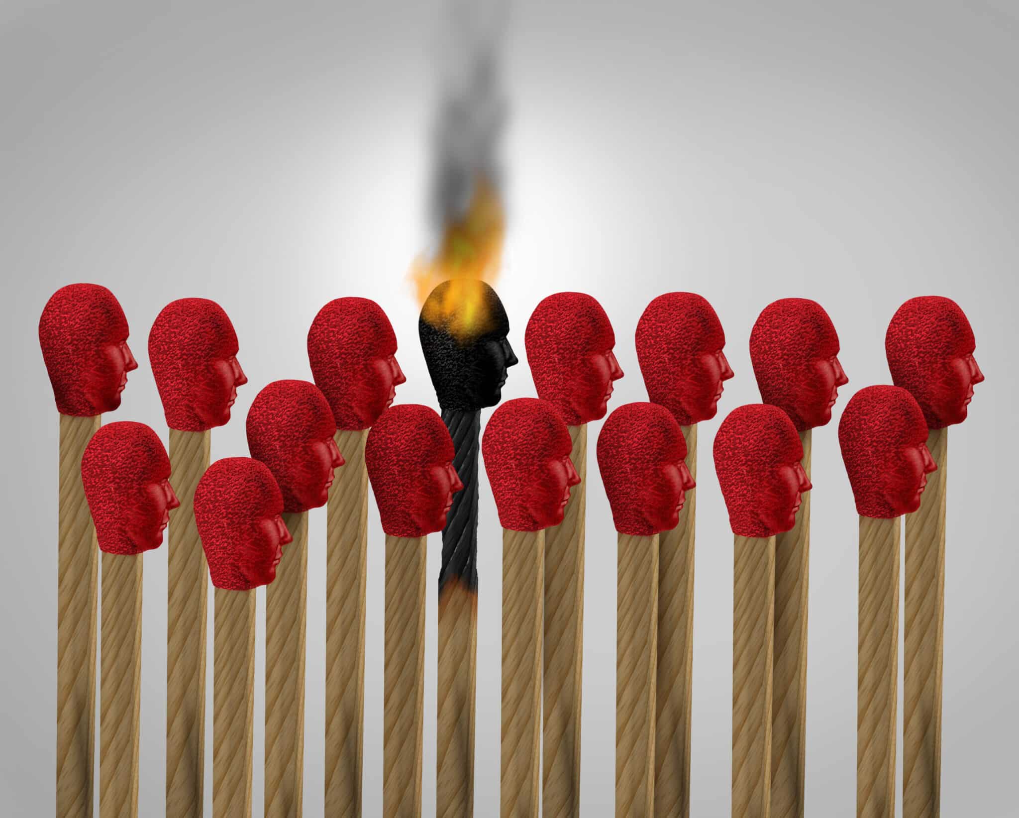 Matches with head that look like people. One match has been struck and is alight.