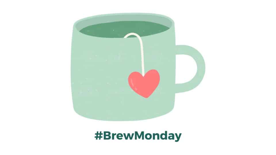 Illustration of a green mug with a tea bag and heart-shaped tag, alongside the text “#BrewMonday”, encouraging people to take a moment to connect and check in with others.