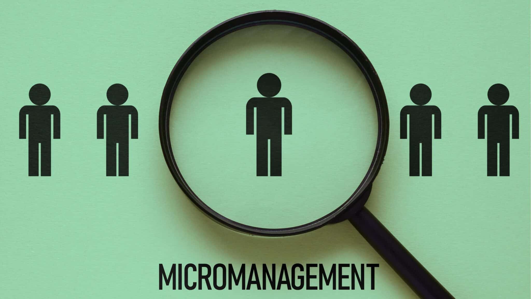 Illustration of a magnifying glass focusing on one person among others, representing micromanagement.