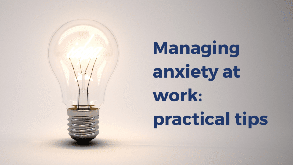 Lightbulb next to the text - Managing anxiety at work: practical tips